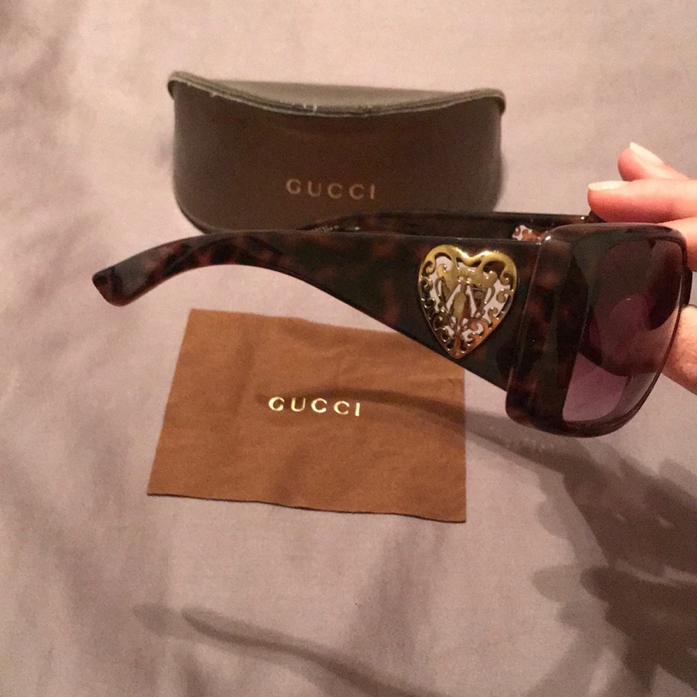 Gucci oversized sunglasses with heart emblem